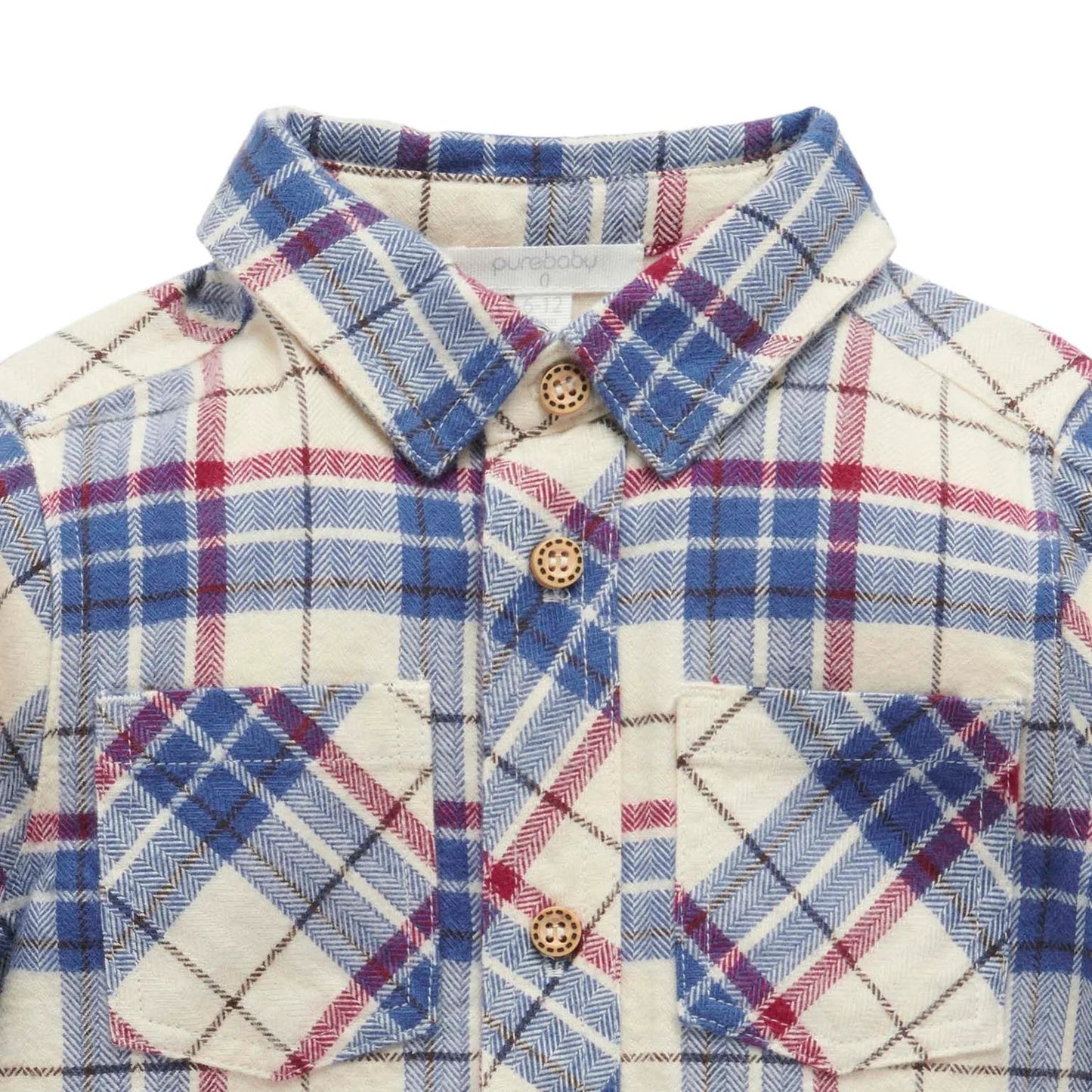 Plaid shirt with blue, red, and white pattern on a white background