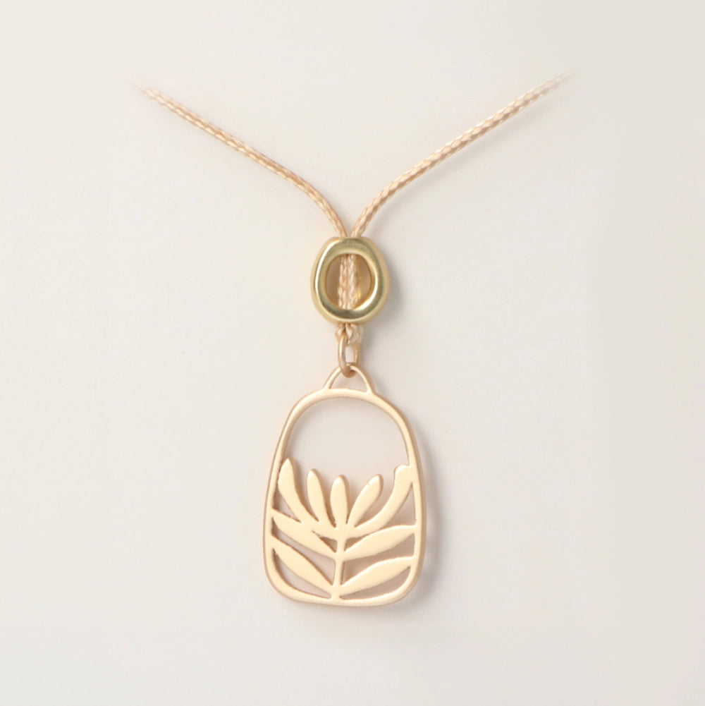 Rancho Necklace Gold Leucadendron Hollow Oval on Tan Cord