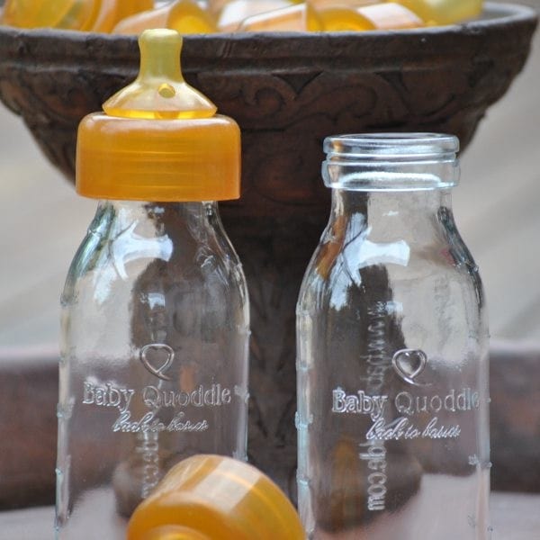 Baby Quoddle glass baby bottles with markings formed directly in the glass